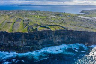 Stand at the cliff edge — carefully